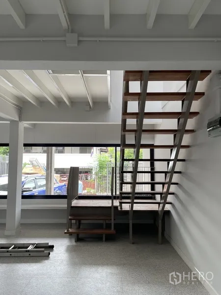 Home Office for rent in Khlong Toei, Bangkok - Interior view of staircase beside a floor-to-ceiling front window