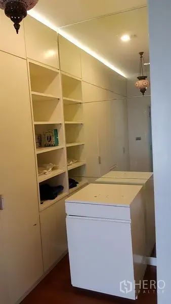 Home Office for sale in Wang Thonglang, Bangkok - Walk-in closet with built-in cabinetry and mirrored wall