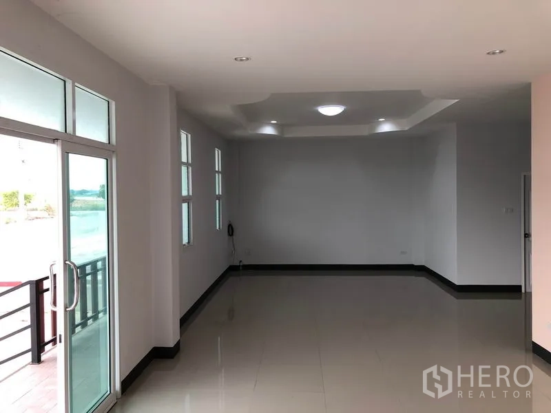 Factory for rent in Bang Len, Nakhon Pathom - Office lobby with glass entry doors, recessed ceiling lights and tiled floor.