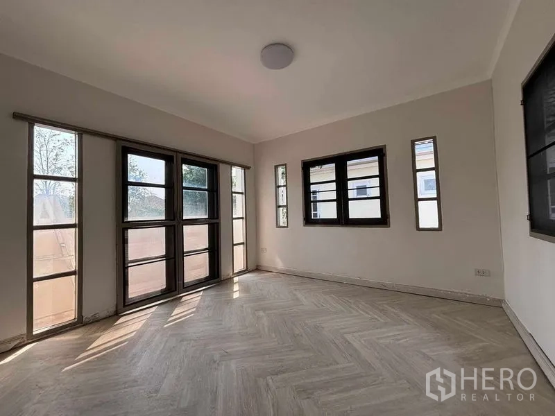 Detached House for rent or sale - Upper family room with herringbone floor and multiple windows.