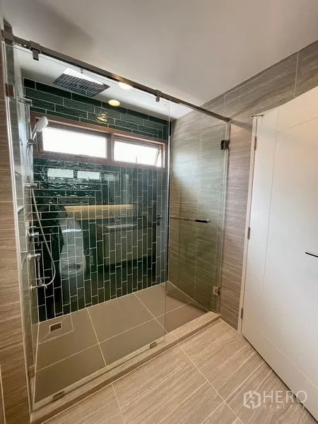 Detached House for rent in Bang Kapi, Bangkok - Walk-in shower with green subway tiles and rainfall showerhead.