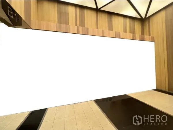 Retail Space for rent in Watthana, Bangkok - Wide basement storefront area with timber cladding and polished floor tiles.