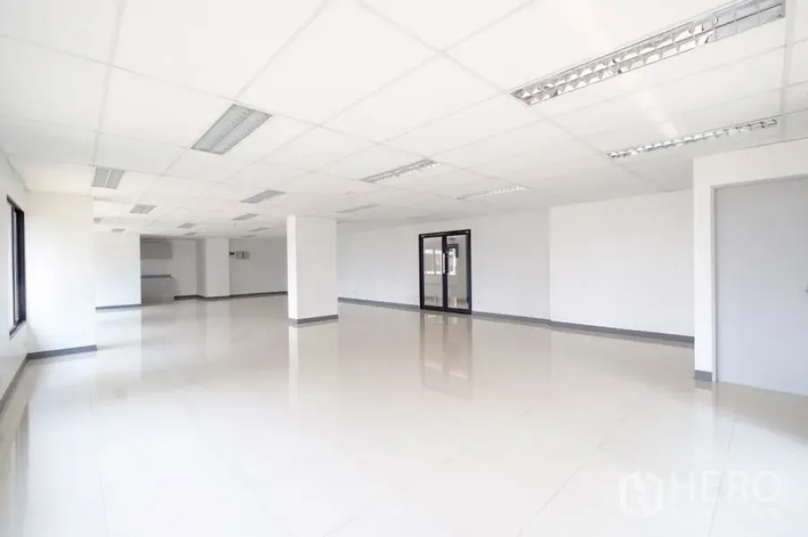 Office Space for rent in Chatuchak, Bangkok - Large empty office with glass entrance and flexible open layout.