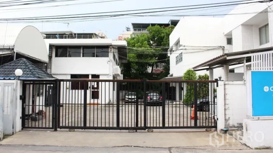 Office Space for rent in Suan Luang, Bangkok - Secure sliding gate entrance to the office compound with parking court