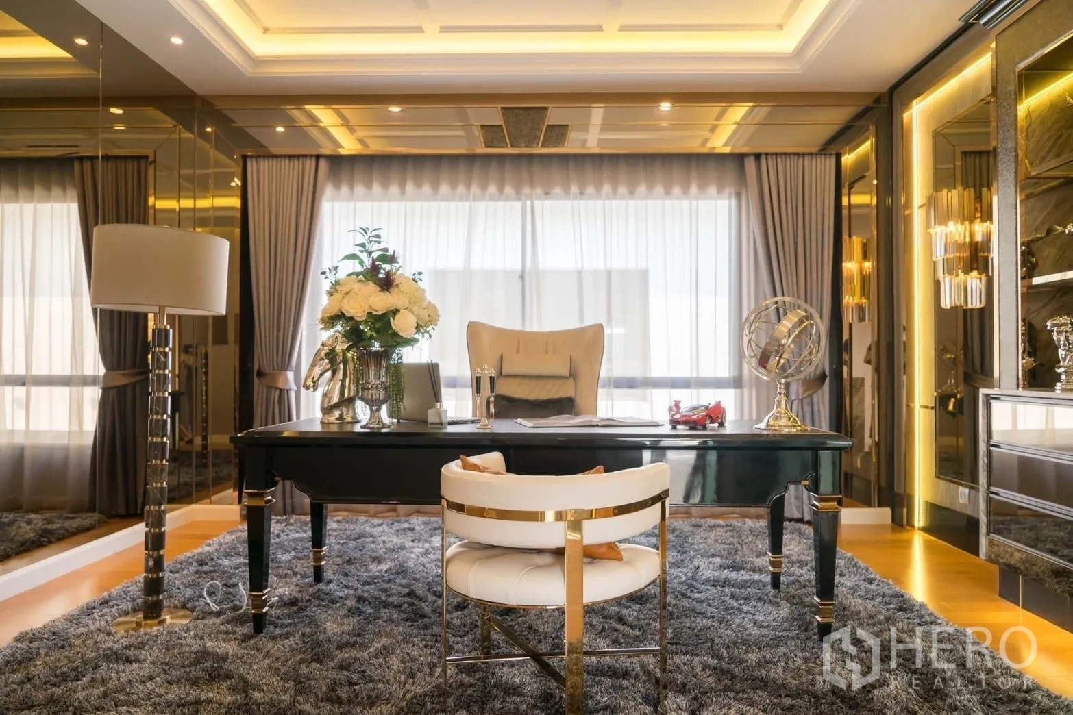 Detached House for rent in Prawet, Bangkok - Luxury home office with coffered ceiling, large desk and floor-to-ceiling curtains in a Prawet Bangkok detached house