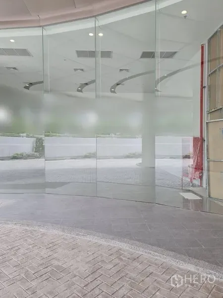 Retail Space for rent - High-visibility glass facade providing clear street exposure for the retail space.