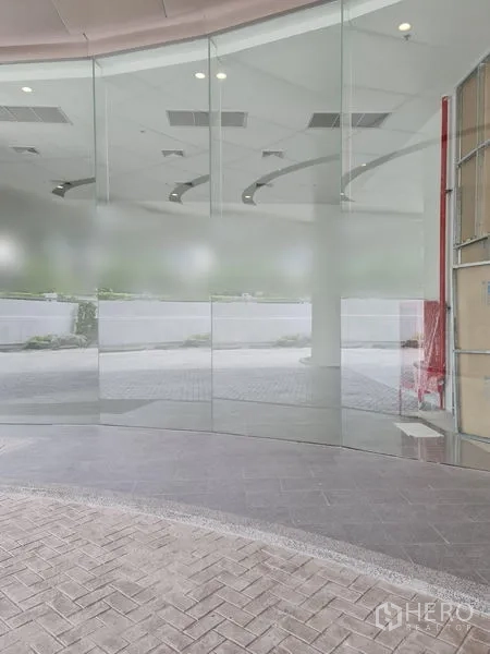 Retail Space for rent - High-visibility glass facade providing clear street exposure for the retail space.