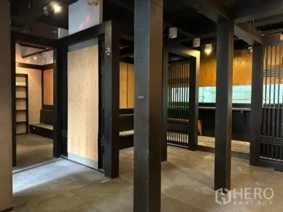 Retail Space for rent in Bang Rak, Bangkok - Partitioned retail floor featuring booth-style sections, wood accents and overhead lighting ready for fit-out.