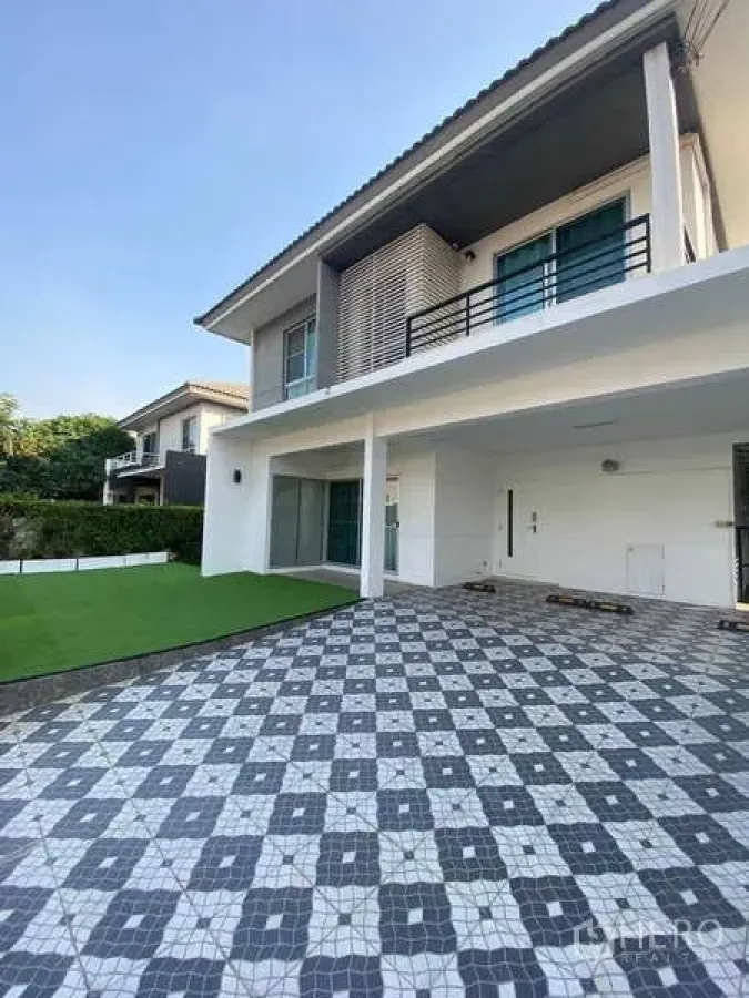 Detached House for rent or sale - Front exterior showing patterned driveway and covered parking.