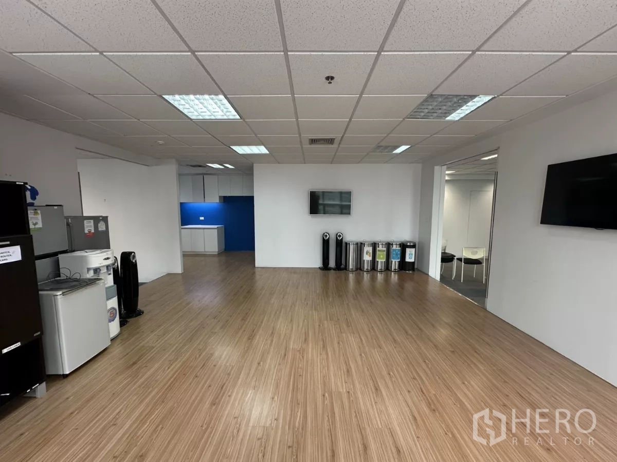 Office Space for rent in Watthana, Bangkok - Spacious staff lounge with televisions and kitchenette to the rear.