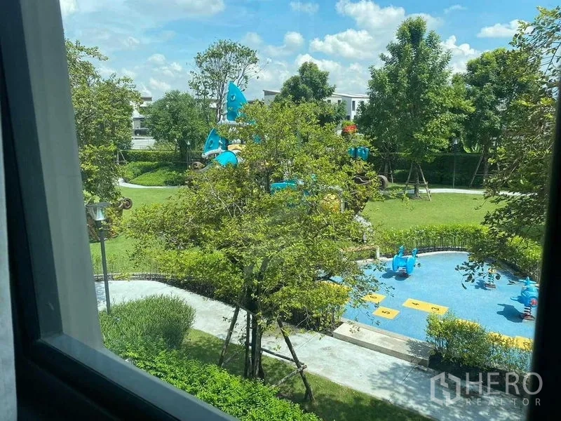 Detached House for rent in Khan Na Yao, Bangkok - View from the window over landscaped communal park and children’s playground.