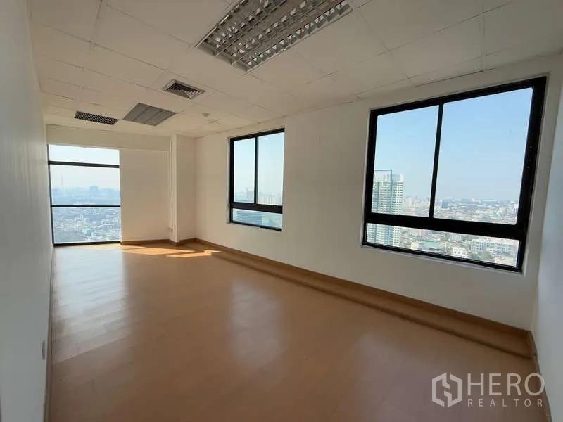 Office Space for rent in Chatuchak, Bangkok - Private office with multiple windows and panoramic skyline outlook.