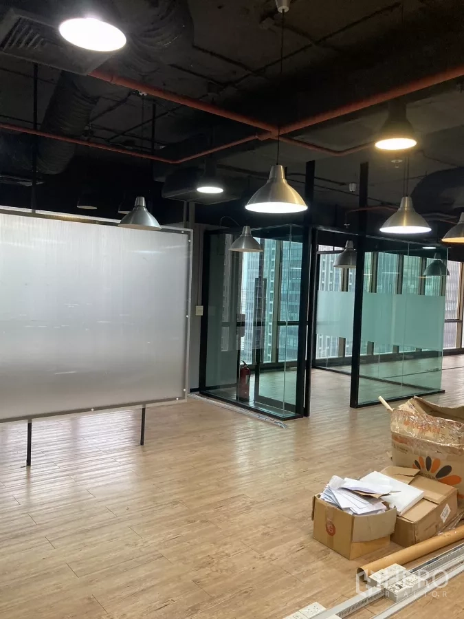 Office Space for rent in Watthana, Bangkok - Industrial ceiling with pendant lighting over glass-partitioned rooms and whiteboard in Watthana.
