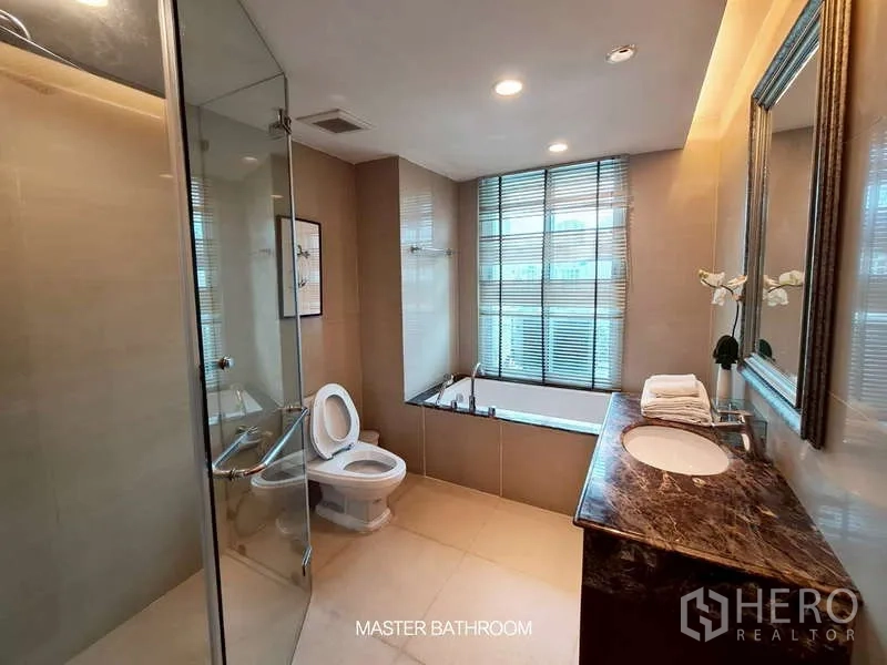 Retail Space for rent in Watthana, Bangkok - Master bathroom with soaking tub, glass shower, and large window