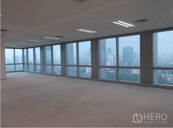 Office Space for rent - Corner office area with full-height glazing showcasing Bangkok skyline views.
