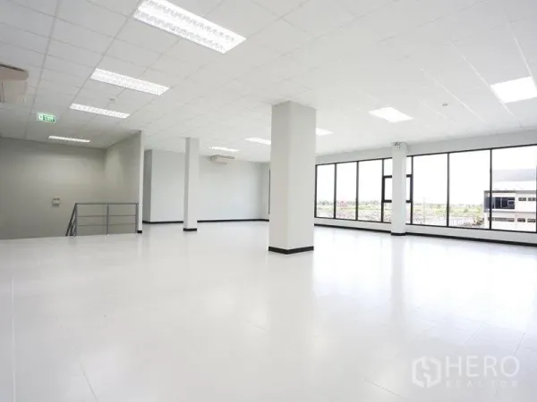 Factory for rent in Bang Pakong, Chachoengsao - Upper-floor office area with panoramic windows overlooking the industrial complex.