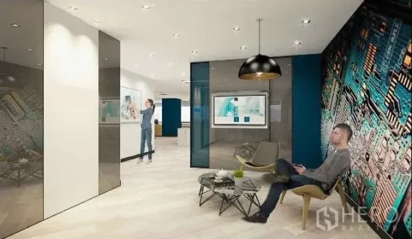Office Space for rent in Chatuchak, Bangkok - Modern reception lounge with glass partitions, feature mural wall and pendant lighting in a Bangkok office.
