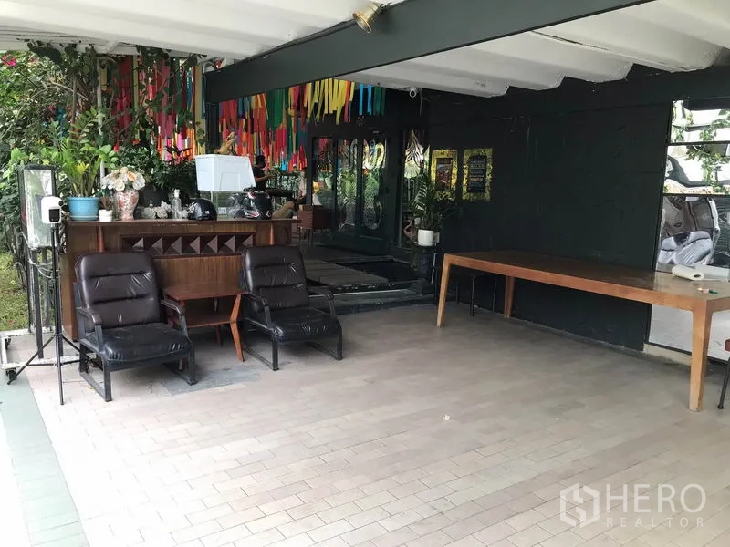 Retail Space for rent in Watthana, Bangkok - Covered entrance lounge with a reception counter and tiled floor.