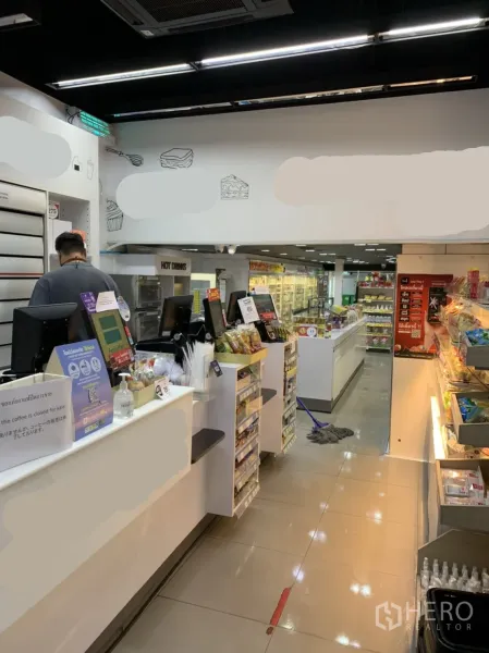 Retail Space for rent in Sathon, Bangkok - Bright retail checkout zone with multiple counters, display racks and modern lighting.