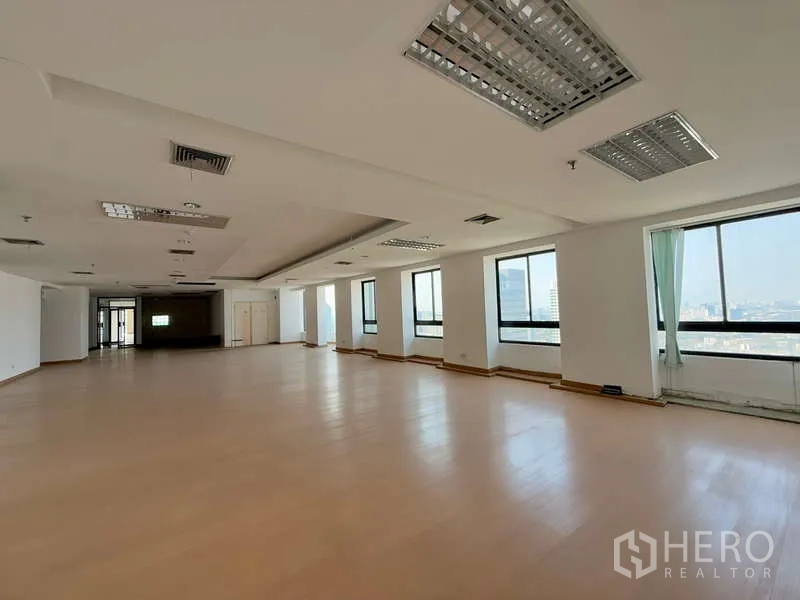 Office Space for rent in Chatuchak, Bangkok - Expansive office floor with wide windows, natural light and distant city views.