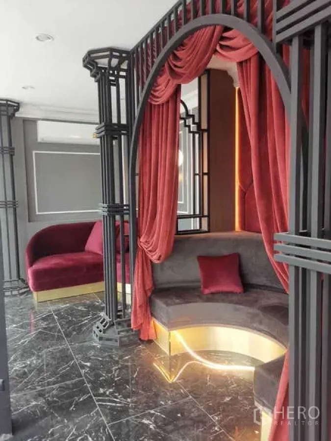 Retail Space for rent - Modern restroom with grey stone tiles and white toilet.