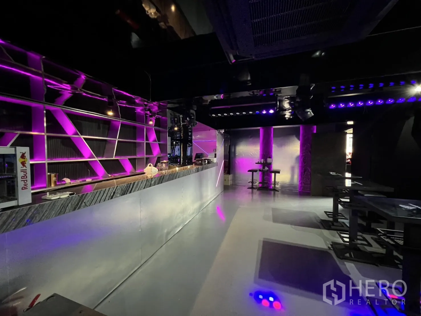 Retail Space for rent in Watthana, Bangkok - Long modern bar counter with purple accent lighting inside the venue.