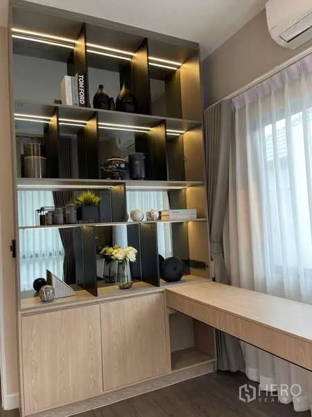 Detached House for rent in Bang Phli, Samut Prakan - Home office nook with window, backlit display shelves and a built‑in desk.