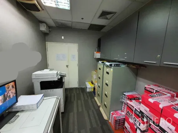 Office Space for rent in Watthana, Bangkok - Printer and storage room featuring filing cabinets, copier and overhead cupboards.