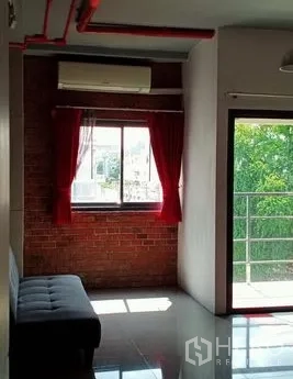 Office Space for rent in Khlong Toei, Bangkok - Corner workspace with brick wall, air-conditioning and access to the balcony.