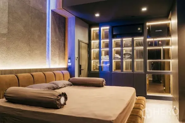 Detached House for sale in Sai Mai, Bangkok - Luxury master bedroom featuring an upholstered bed and illuminated built‑in wardrobes.