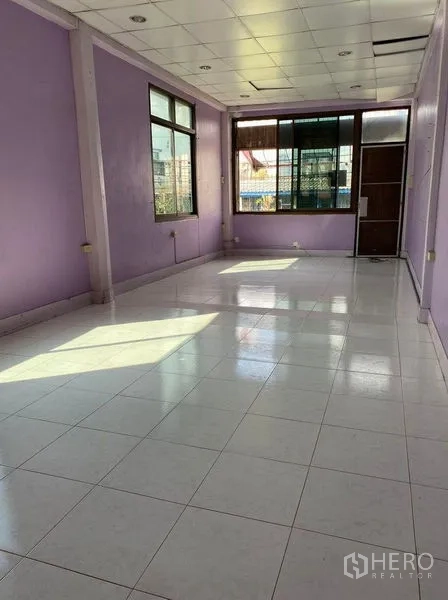 Retail Space for rent in Sathon, Bangkok - Bright upper-floor room with large windows and white tile floors.