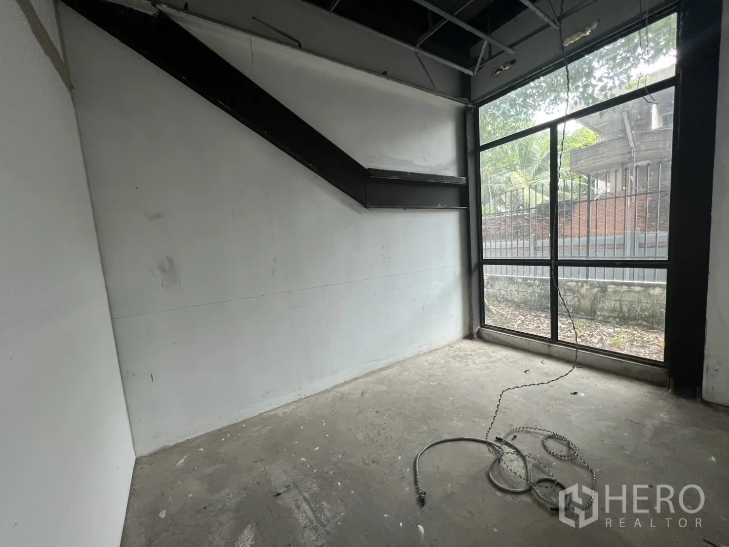 Retail Space for rent in Watthana, Bangkok - Upper floor open dining space with wood flooring and green views.
