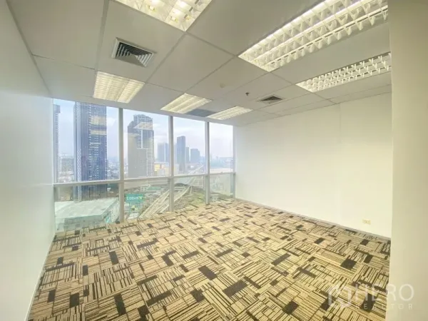 Office Space for rent in Chatuchak, Bangkok - Corner office with floor-to-ceiling windows and skyline views near Ha Yaek Lat Phrao BTS.