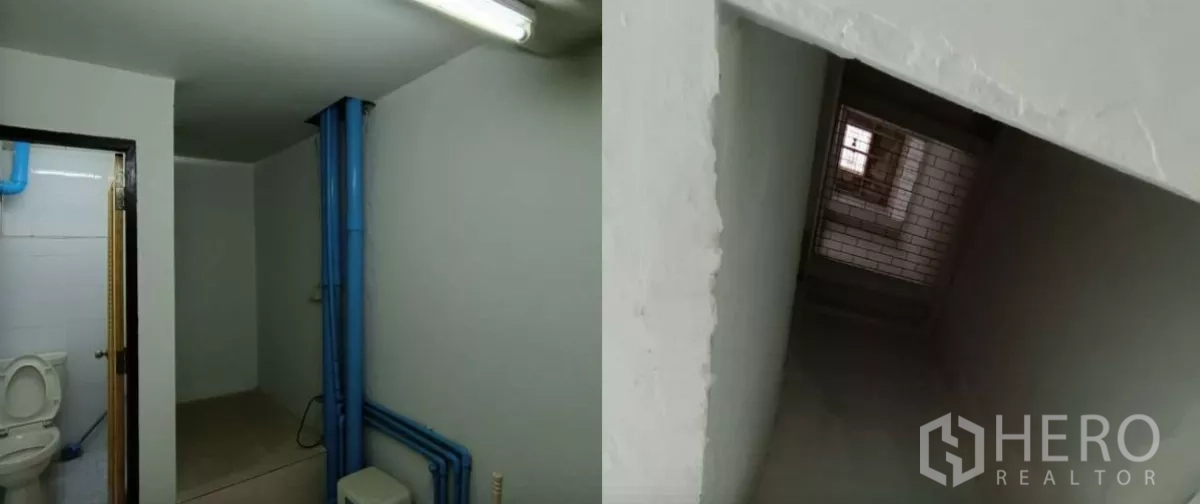 Shophouse for rent in Bang Rak, Bangkok - Basic restroom with exposed blue plumbing and a narrow internal stairwell.