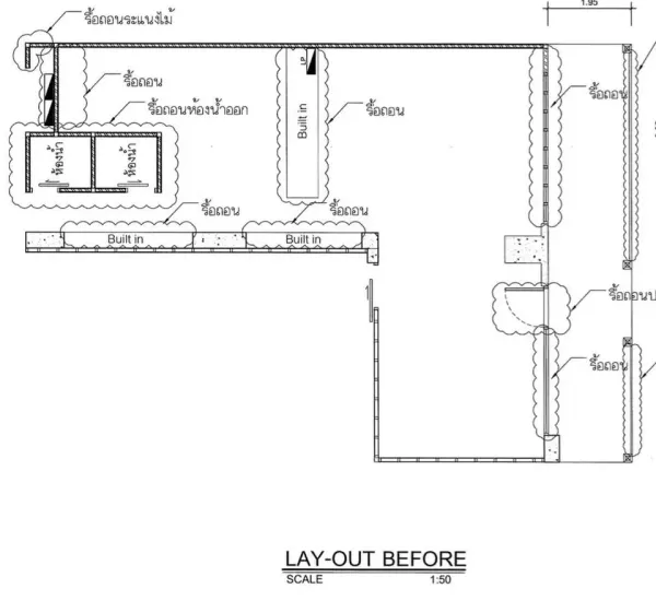 Retail Space for rent in Watthana, Bangkok - Floor plan of the ground-floor retail space outlining built-in counters and restroom areas.