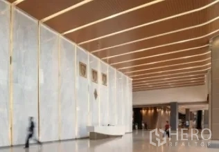 Office Space for rent in Ratchathewi, Bangkok - Grand reception hall featuring high ceilings, linear lighting and white marble walls.