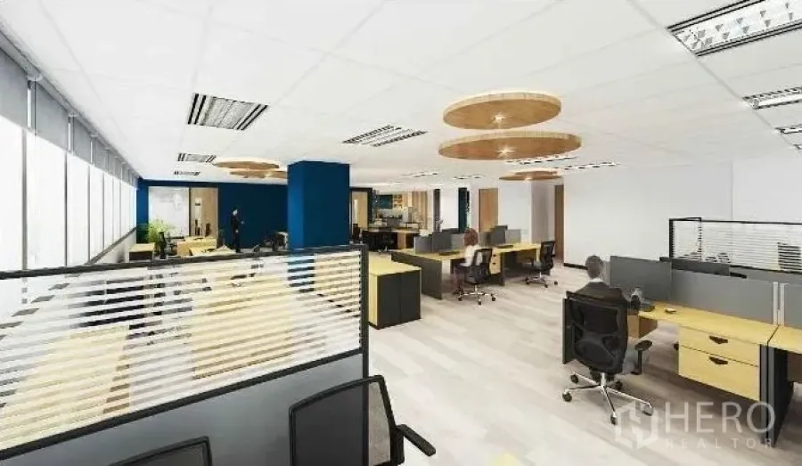 Office Space for rent in Chatuchak, Bangkok - Open-plan workspace with partitioned desks, large windows and light wood floors.