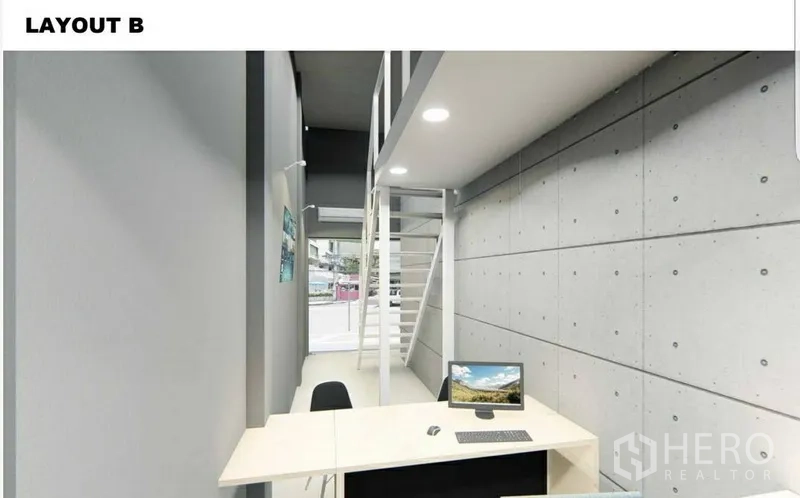 店屋 出租在Watthana, Bangkok - 布局渲染图，展示带夹层的前厅与办公桌。